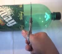 cutting the bottle top
